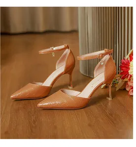 Elegant tan crocodile pattern pointed-toe d'Orsay stiletto heels with ankle straps