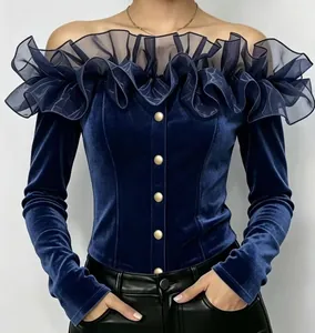 Elegant navy velvet off-the-shoulder top featuring delicate organza ruffles and gold buttons.