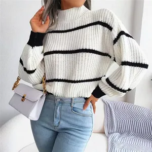 Detail of a casual striped knit sweater with lantern sleeves and semi-high collar