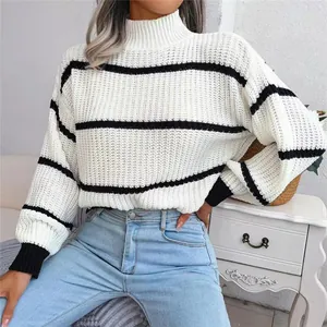 Mock neck knit sweater with black stripes and stylish lantern sleeves on model