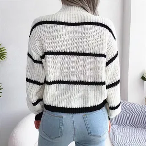 Detailed back view of the striped lantern sleeve knit sweater with fine texture