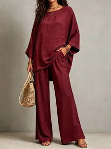 Elegant wine red cotton linen two-piece set featuring a loose top and wide-leg trousers