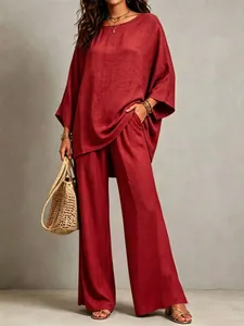 Detail showing the elegant drape and texture of this red cotton linen two-piece set