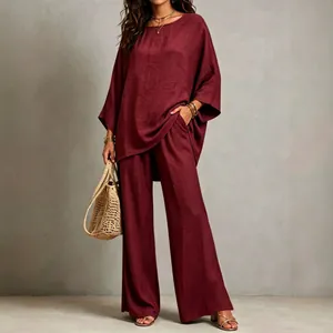 Elegant burgundy two-piece cotton linen set with oversized top and wide-leg trousers