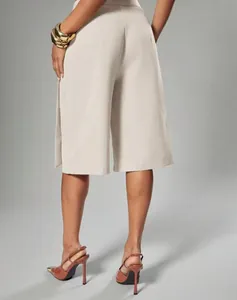 Elegant beige wrap wide-leg culottes for women shown from the back view for office