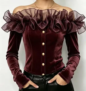 Detailed view of the ruffle collar and gold button accents on a velvet off-shoulder top.