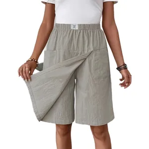 Stylish women's casual wrap front skirt-shorts with utility pockets in sage green finish