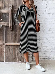 Stylish long sleeve black and white striped hooded dress with front zipper detail