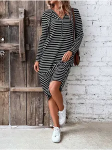 Detail of long sleeve striped hooded dress with zipper neckline for autumn