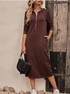 Stylish autumn striped hooded long sleeve maxi dress featuring half-zip and functional pockets