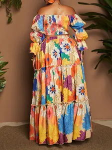 Back view of colorful floral print two-piece set with off-shoulder crop top and maxi skirt