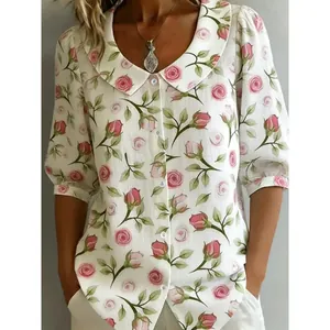 Camicia da donna a fiori con colletto a bambola e chiusura con bottoni estiva