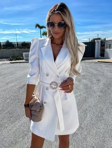 Elegant white double-breasted blazer dress with puff sleeves and decorative belt