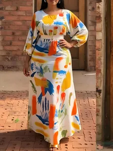 Detailed view of women's plus size two-piece set with vibrant colorful abstract print.