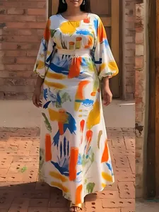 Detailed view of a stylish plus-size two-piece set with vibrant abstract prints.