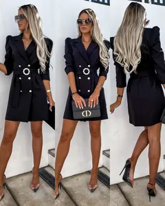 Elegant black double-breasted blazer dress with puff sleeves and waist belt for women.