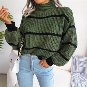 Close-up of green and black striped mock neck knit sweater with lantern sleeves