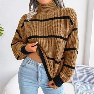 Close-up view of a woman wearing a brown and black striped mock neck lantern sleeve sweater