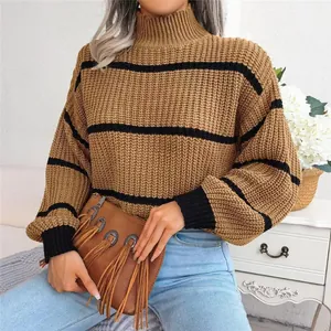 Macro detail of a camel striped knit sweater featuring high neck and lantern sleeves.