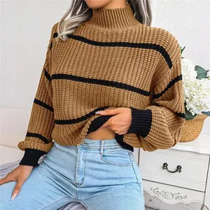 Close-up of a brown striped mock neck sweater with lantern sleeves on a fashion model