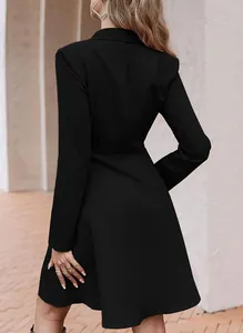 Back view of a classic black long sleeve double-breasted blazer dress for women