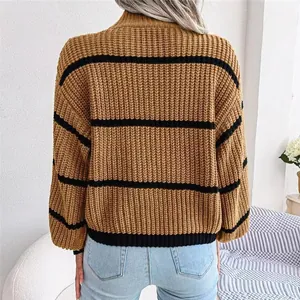 Back view of a chic casual striped knit sweater featuring a mock neck and lantern sleeves.