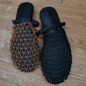 Summer woven mesh flat mules featuring a hollow breathable design for beach vacation