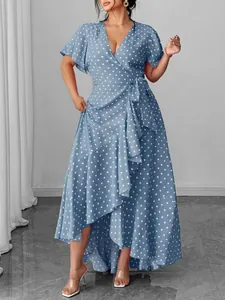 Detailed view of a light blue polka dot wrap midi dress with V-neck and ruffled hem.