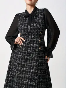 Elegant black tweed plus size dress with bow tie and sheer mesh sleeves