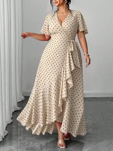 Plus size beige polka dot wrap dress with V-neck and ruffled asymmetrical hemline