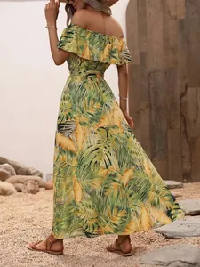 Back view of a chic summer off-the-shoulder maxi dress with tropical leaf print