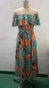 Full front view of a tropical print off-the-shoulder ruffle maxi dress on mannequin