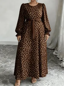 Elegant leopard print maxi dress with long puffed sleeves and brown waist tie belt