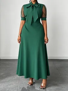 Elegant dark green mesh patchwork maxi dress with a sophisticated bow-tie collar