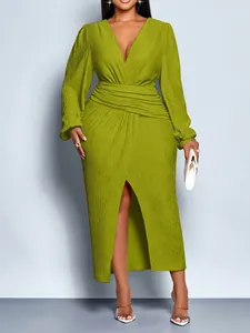 Full-length view of elegant lime green pleated midi dress with V-neckline and slit