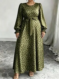 Full view of olive green leopard print maxi dress showing sleeve and belt details