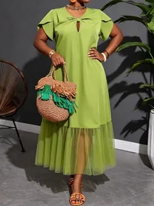 Elegant plus size lime green midi dress with mesh tulle hem and chic cutout V-neck detail