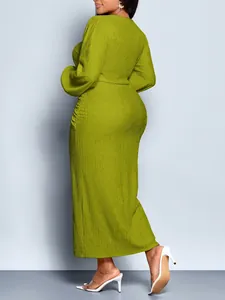 Elegant green textured plus size maxi dress with balloon sleeves and side ruched detail