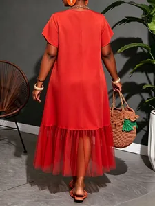 Detail of back view red plus size midi dress with mesh splicing hem for summer