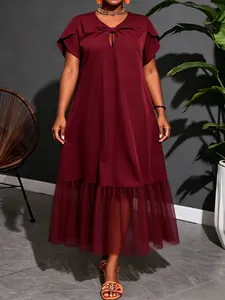 Elegant wine red midi dress with sheer mesh hem and keyhole knot neckline design
