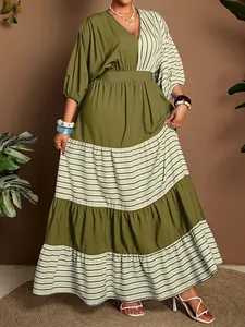 Full detail view of elegant plus size olive green color block striped tiered maxi dress