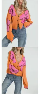 Gilet en maille jacquard floral orange et rose pour femme avec col en V et boutons
