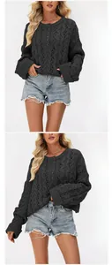 Detail view of dark grey hollow-out knit sweater with button neckline design