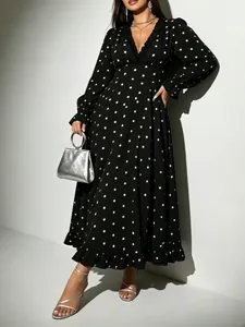 Vintage style plus size V-neck polka dot midi dress with elegant ruffle trim and long sleeves