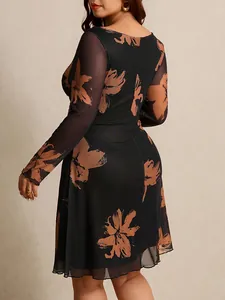 Elegant plus size floral print mesh midi dress with long sleeves and round neck