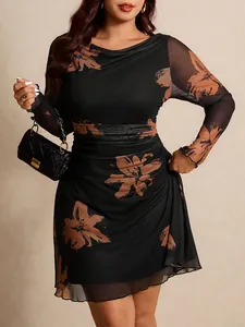 Elegant plus size floral print midi dress with sheer mesh long sleeves for women