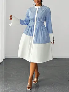 Elegant striped patchwork midi dress with polo collar and wide white sleeve cuffs