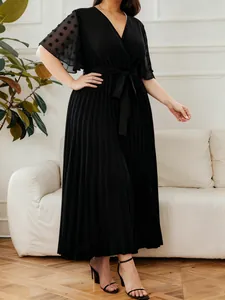 Elegant plus size black V-neck pleated maxi dress with polka dot mesh sleeves