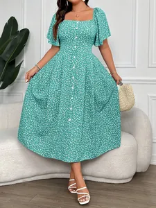 Elegante abito midi a fiori verdi con scollo quadrato e vita stretta per l'estate