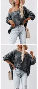 Detailed macro view showing the gray cable knit texture on this oversized off-shoulder sweater